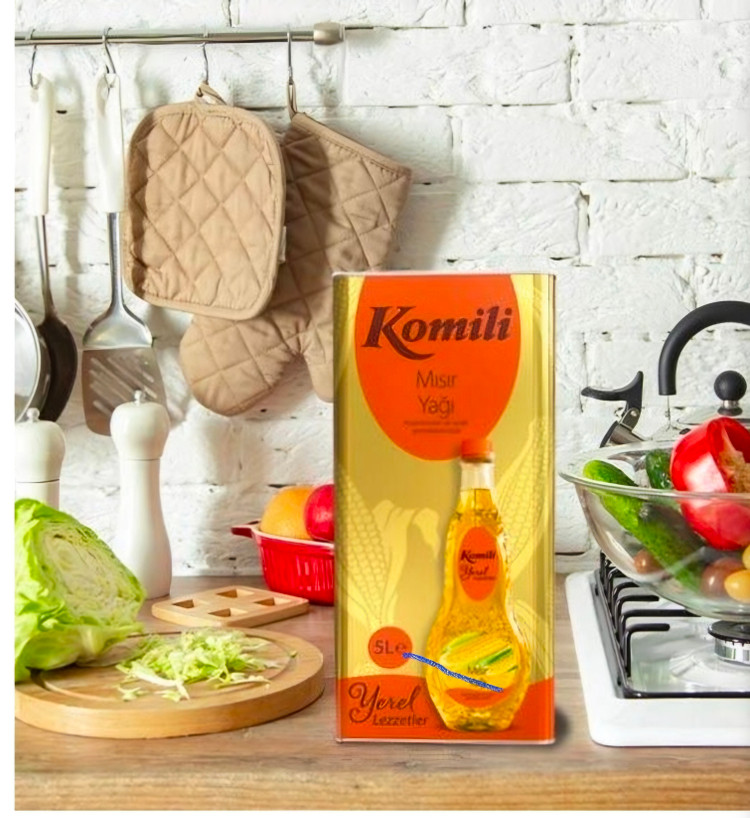 روغن ذرت برند کومیلی اصلی ، محصول وارداتی از ترکیه ، بسته بندی حلب ۵ لیتری اورجینال